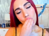 Redhead Babe Toys with Her Squirting Dildo